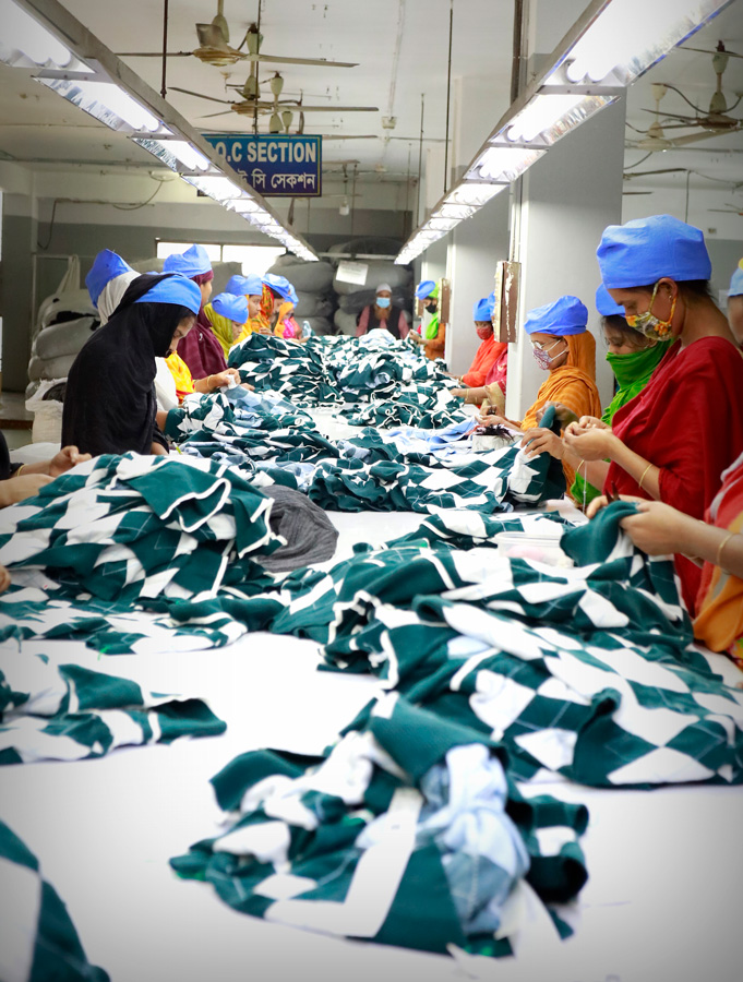 Factory worker operating machinery in a manufacturing facility